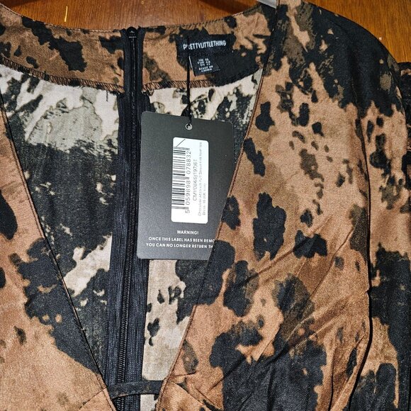 PrettyLittleThing Brown & Black Animal Print Mini Dress With Puff Sleeves & Tier - Picture 2 of 6